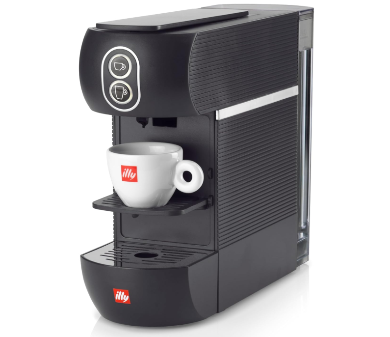 Illy coffee machine on a kitchen counter brewing espresso