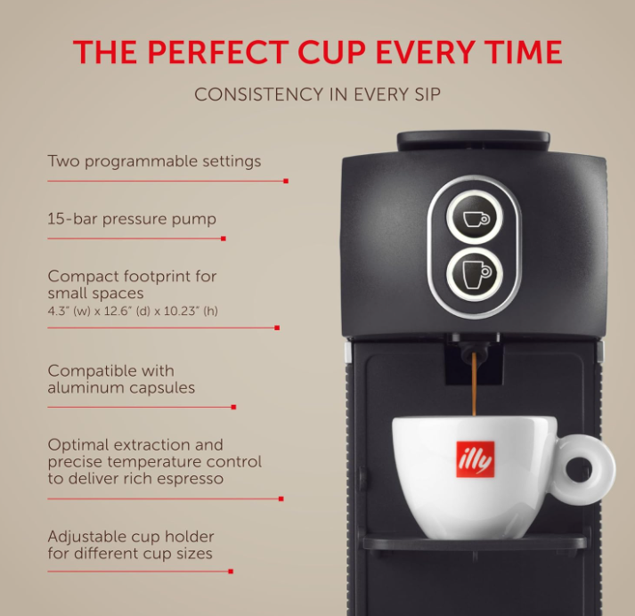 Close-up of espresso cup under the Illy espresso maker spout