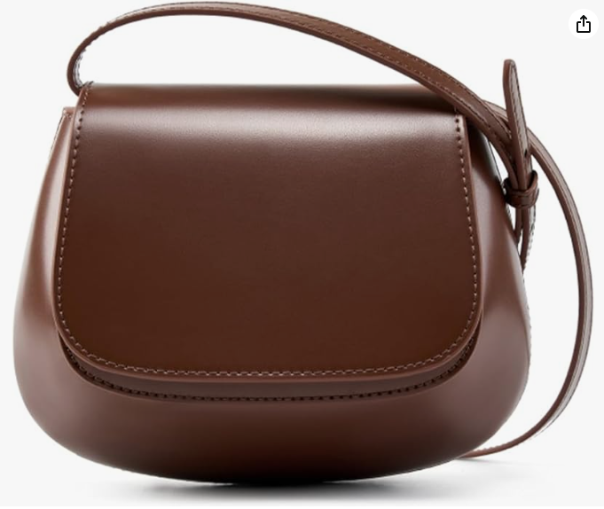 Leather crossbody mini bag styled with jeans and sneakers